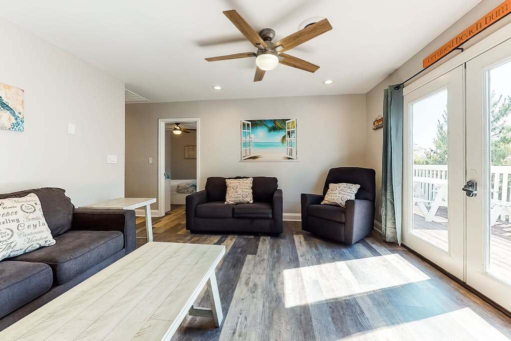Newly-renovated, waterfront retreat with a furnished deck - walk to the beach