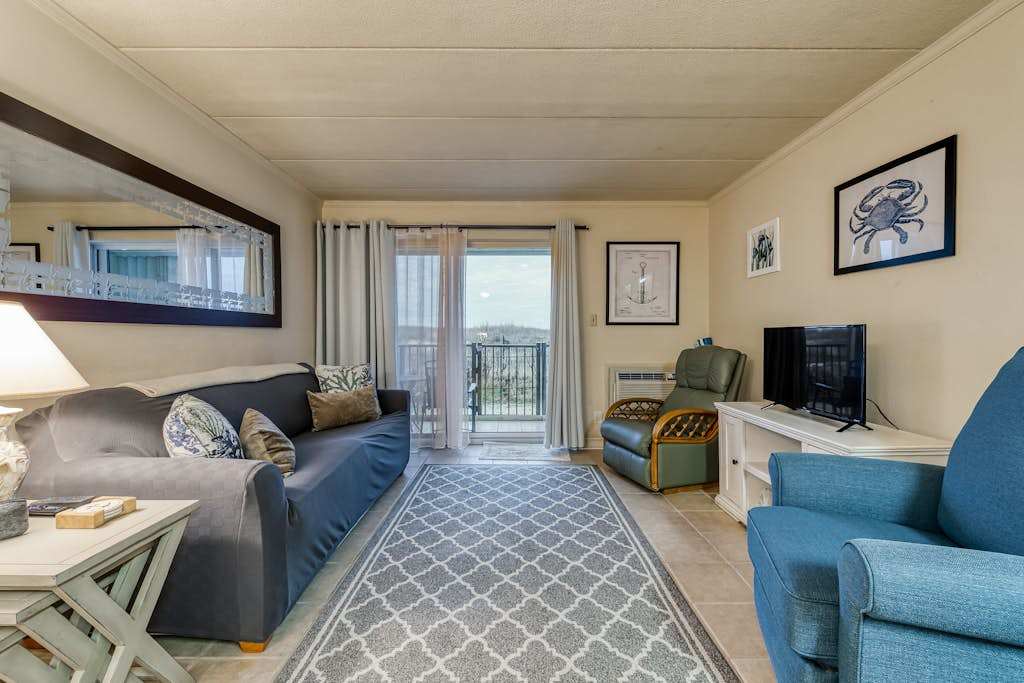 Charming 1st-Floor Condo with Private Balcony, Free WiFi, Partial AC, and washer & dryer