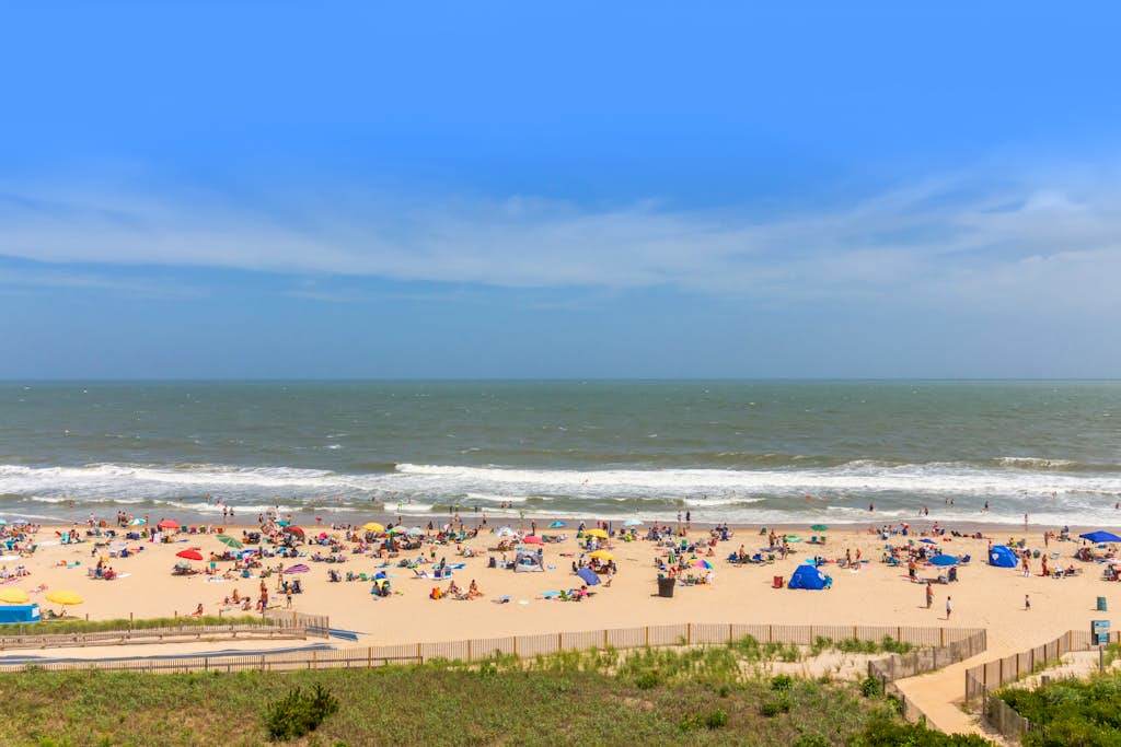 Top-floor, beachfront condo with private balcony, ocean views, and beach access