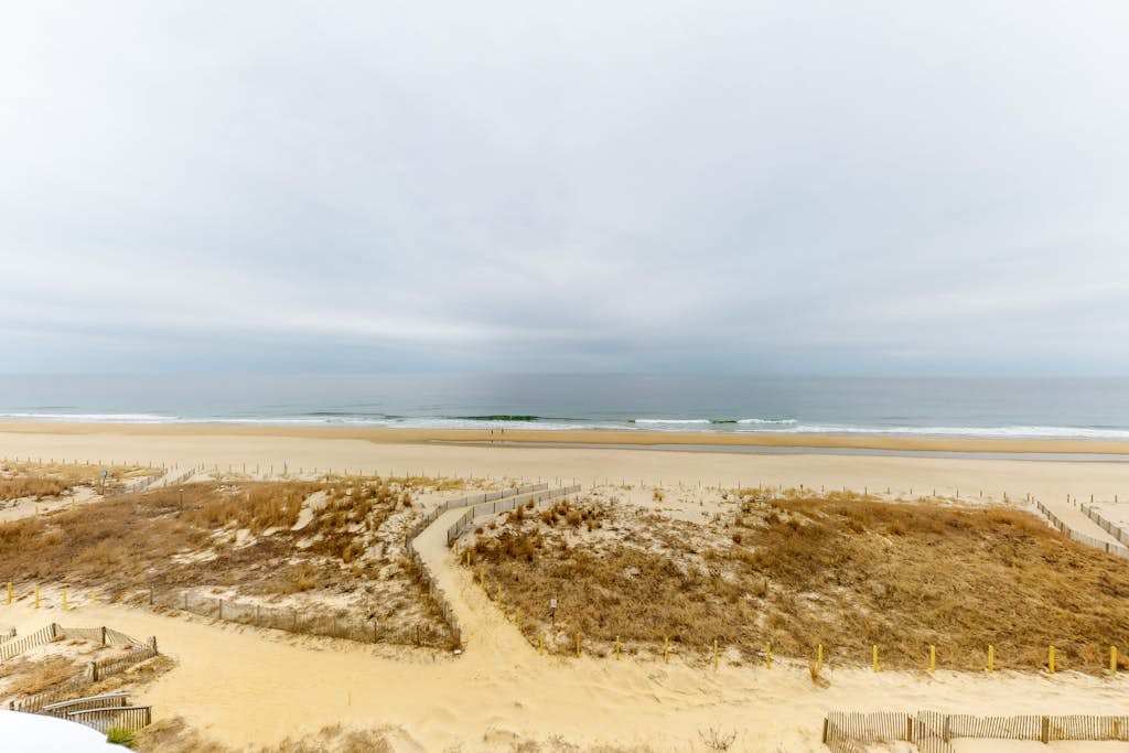 Sixth-floor oceanfront condo with central AC, washer & dryer, furnished balcony