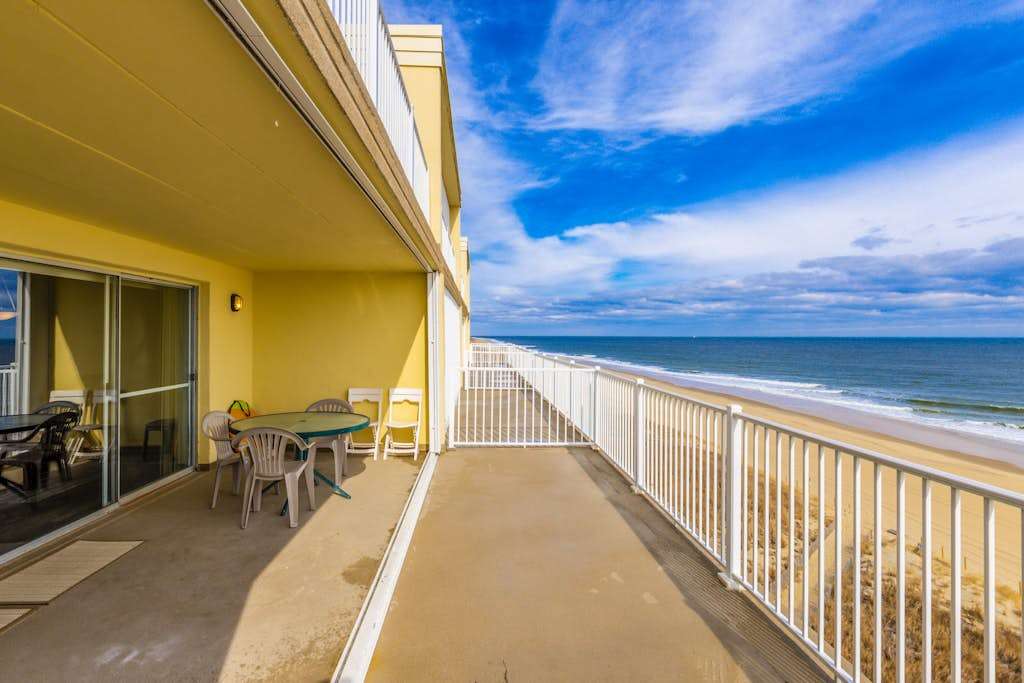 Oceanfront Calypso Condo with Ocean View Balcony, WiFi, Laundry & Shared Pool