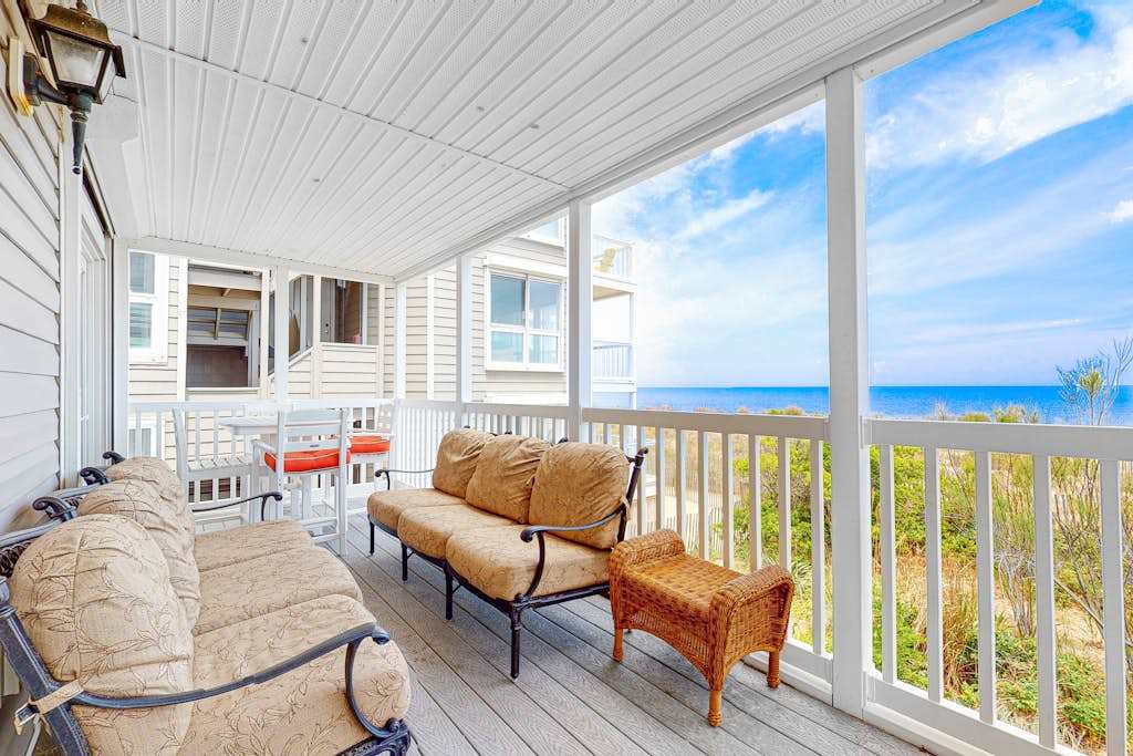 Oceanfront Happy House duplex with WiFi, washer & dryer, ocean views, & beach access