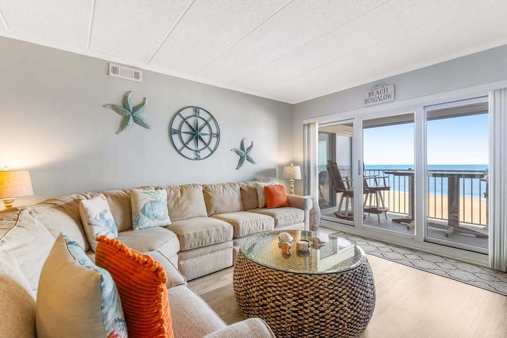Oceanfront Pelican Beach condo with sunrise ocean views, AC, laundry & WiFi