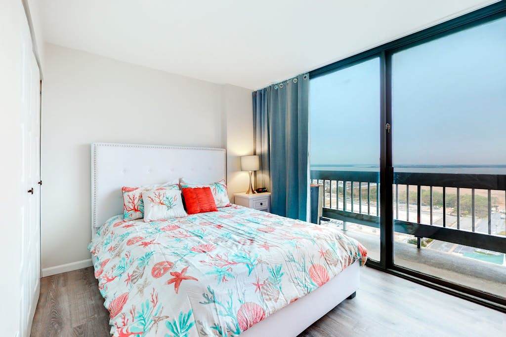 Oceanfront Getaway with Private Balcony, Free WiFi, Beach Access & Shared Pool