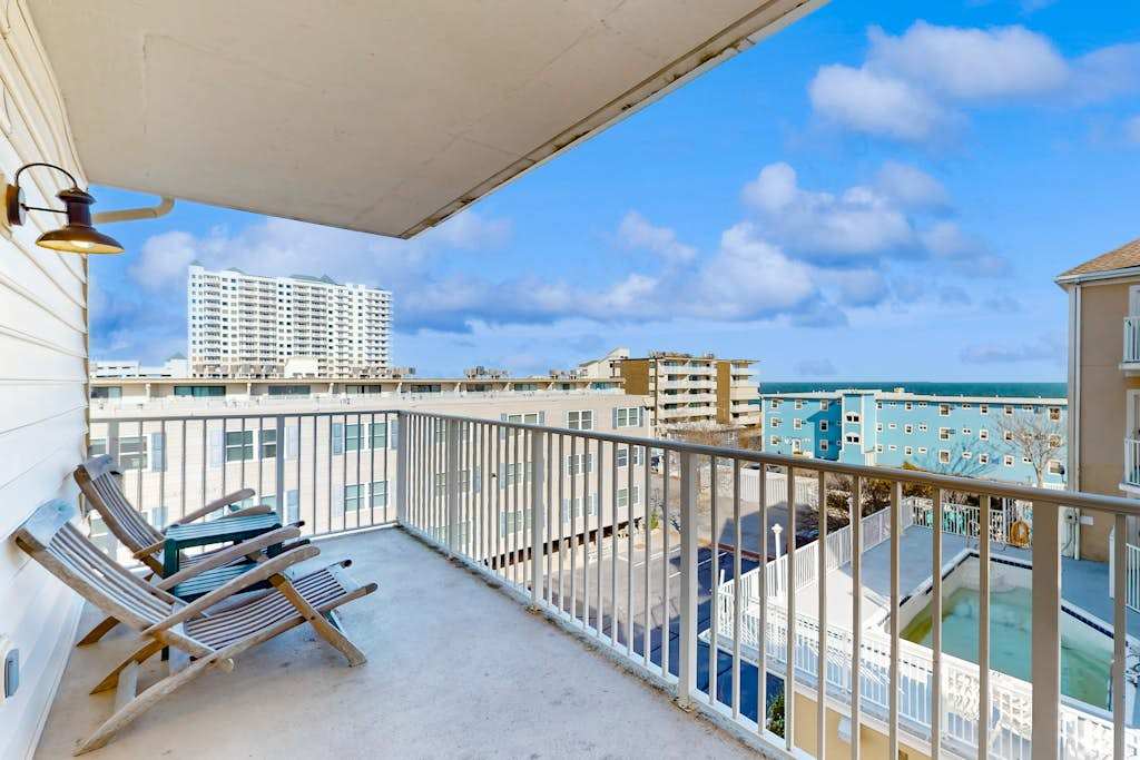 Sea Palms condo with fireplaces, private washer & dryer, and ocean view - 350 feet to beach
