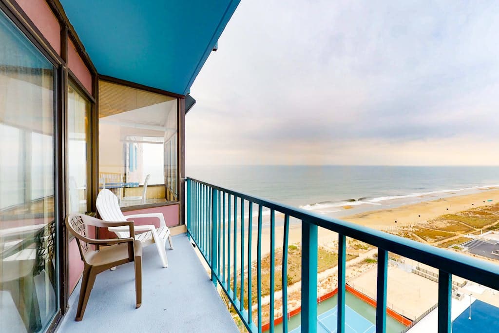 Beachfront Condo with Private Balcony, Telescope, Shared Pool, AC, Free WiFi