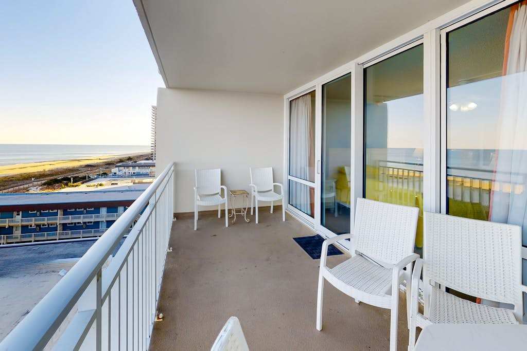 Oceanfront coastal condo with balcony, pools, sauna, gym, AC, & WiFi