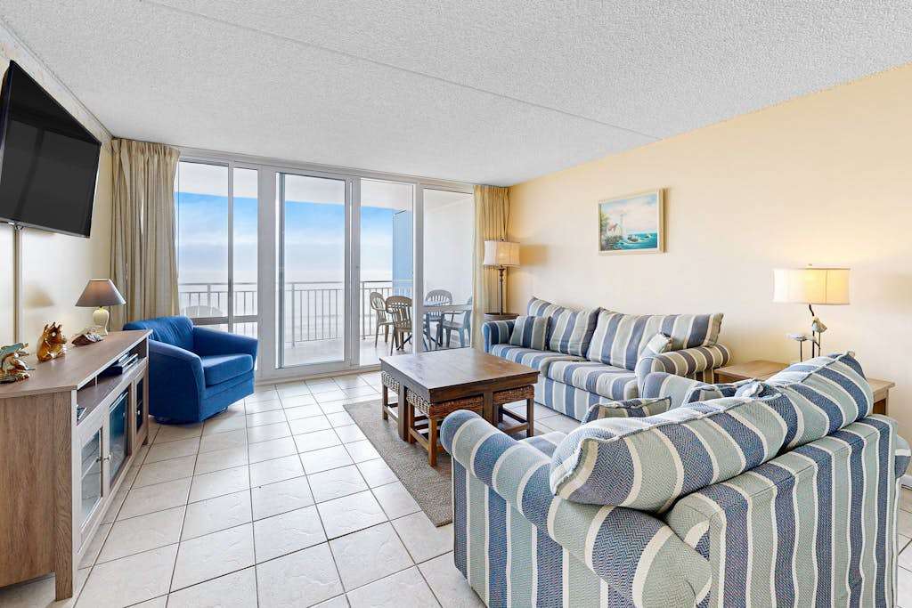 Beachfront condo with incredible views, balcony, pools, gym, sauna, & AC