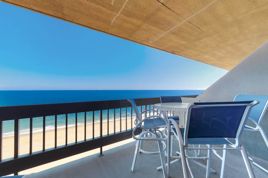 Attractive oceanfront condo with sunset views, two balconies, pool & Central AC