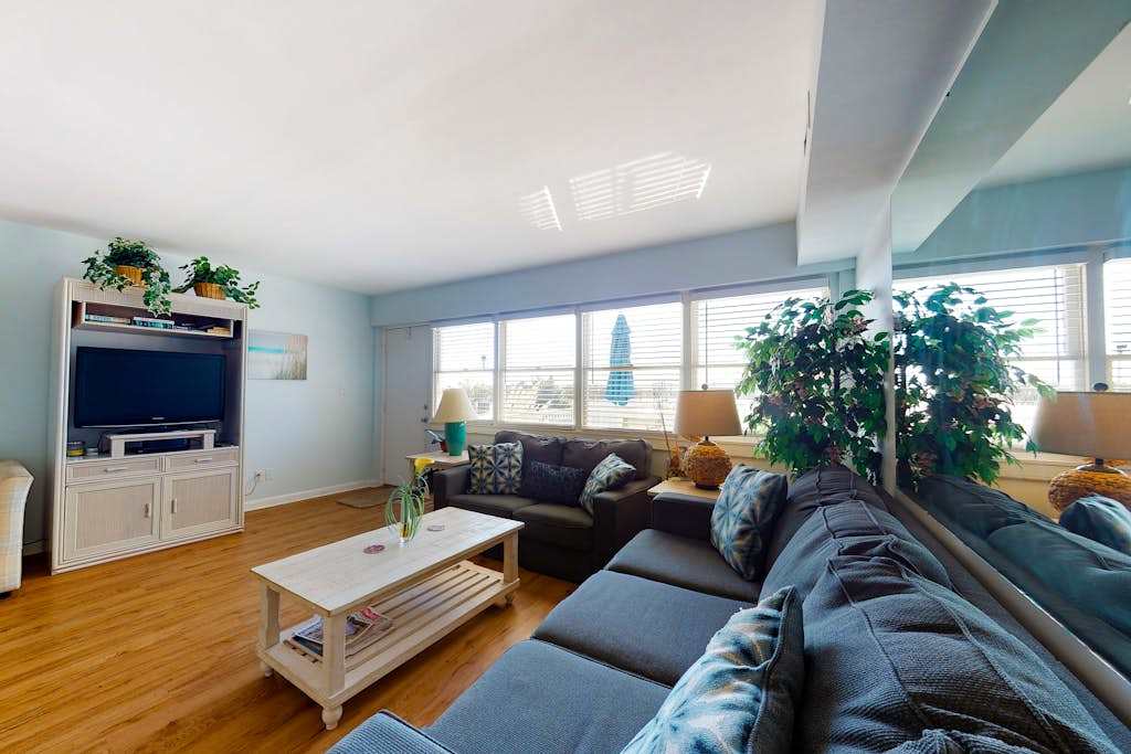 Steps to the beach - condo with 2 balconies, central AC & pool