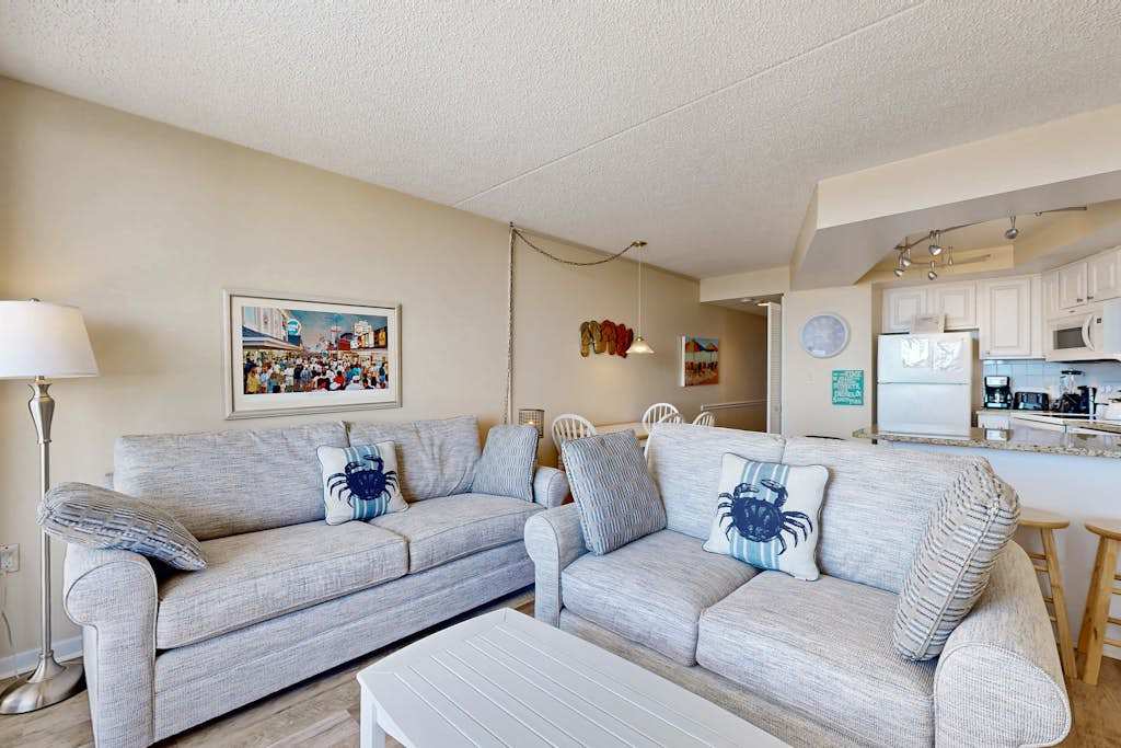 Desirable beach condo with great location, views, balcony, pools & game room