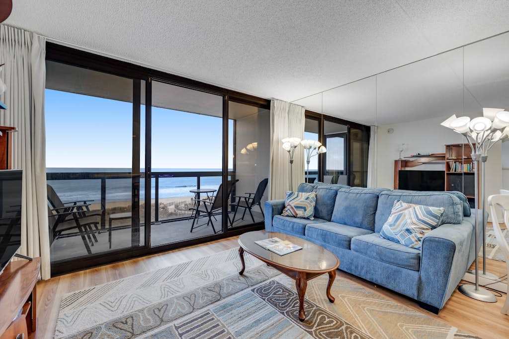 Incredible beachfront condo with balcony, pools, gym & tennis
