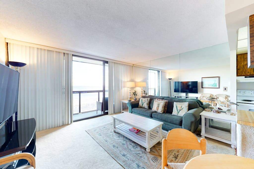 Classic beachfront condo with private balcony views, pools, tennis & New HVAC