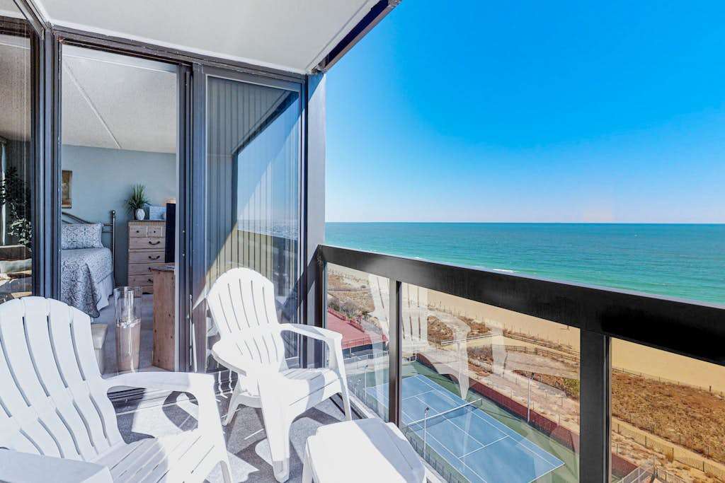 Classic beachfront condo with pools, beach bar, tennis & AC