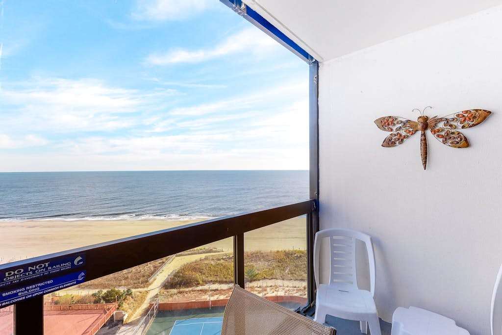 Great condo with angled ocean views, balcony, washer & dryer & pools