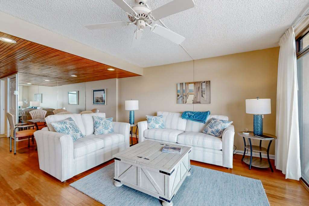 Exquisite beachfront condo with pool & beach views & balcony