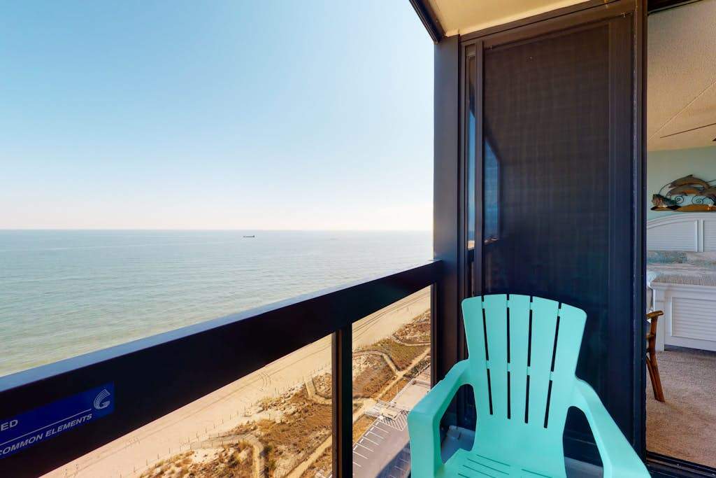 Budget-friendly beachfront condo with balcony, pools, gym & sauna