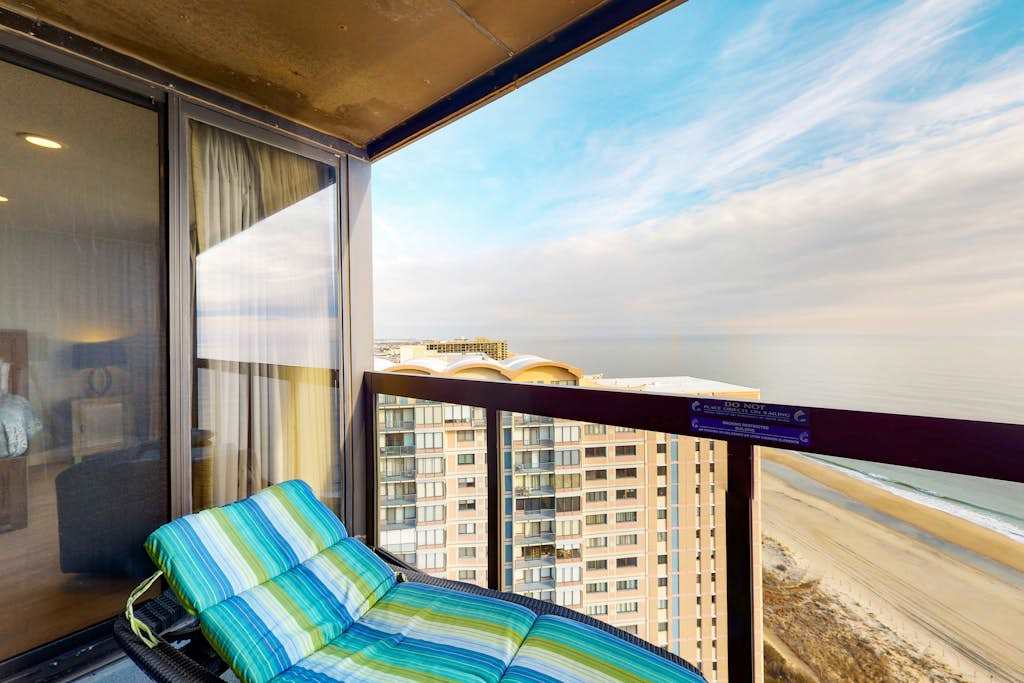Updated waterfront condo with balcony, pools, game room, sauna & gym