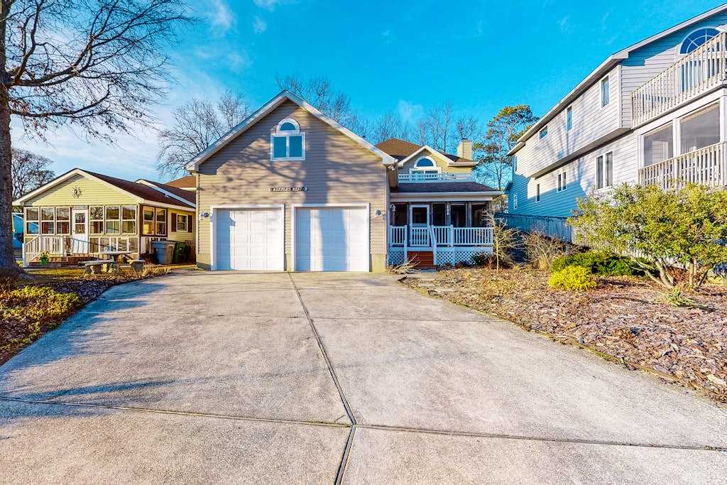 Large, Quiet Family Home with Deck, Porch & WiFi - Walk to the Beach, Shops & More