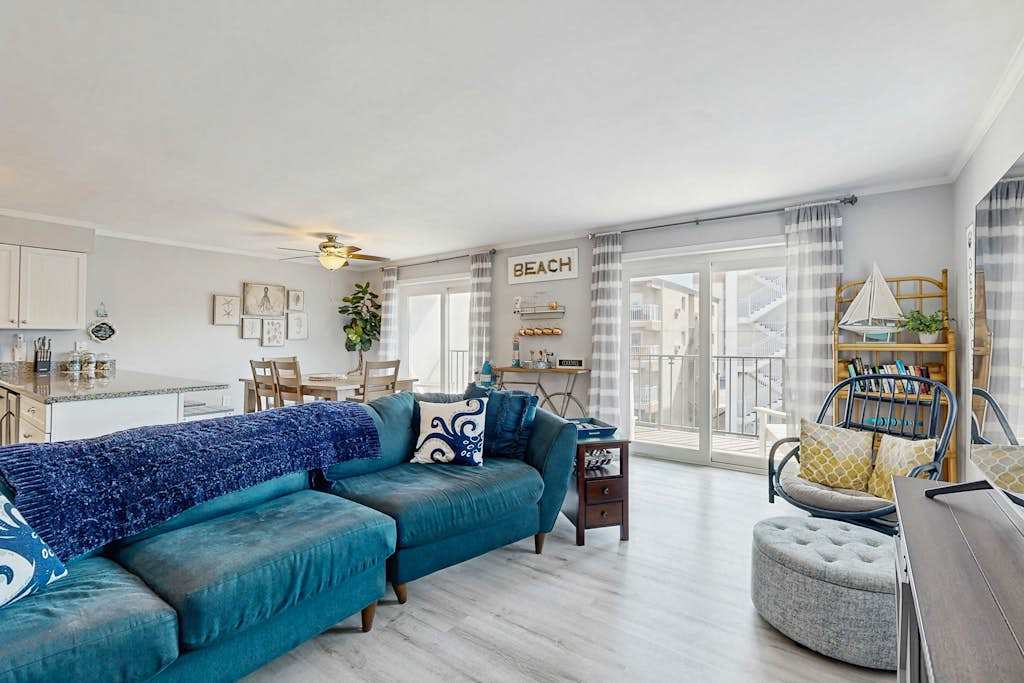 Second-Floor Condo 1 Block from the Beach with Balcony, AC, WiFi & Shared Pool
