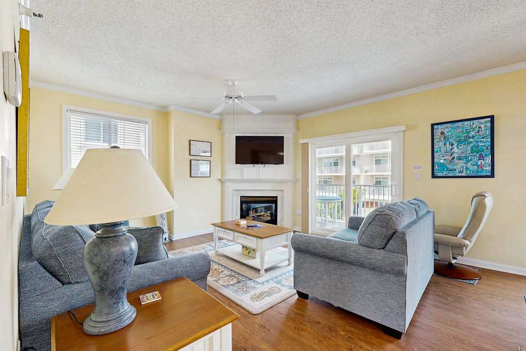 Ocean Block Condo with 2 Balconies, AC, Fireplace, Laundry & Shared Pool