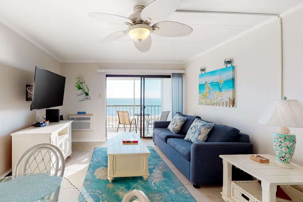 Air-Conditioned Condo Steps from the Beach with Balcony, WiFi, washer & dryer