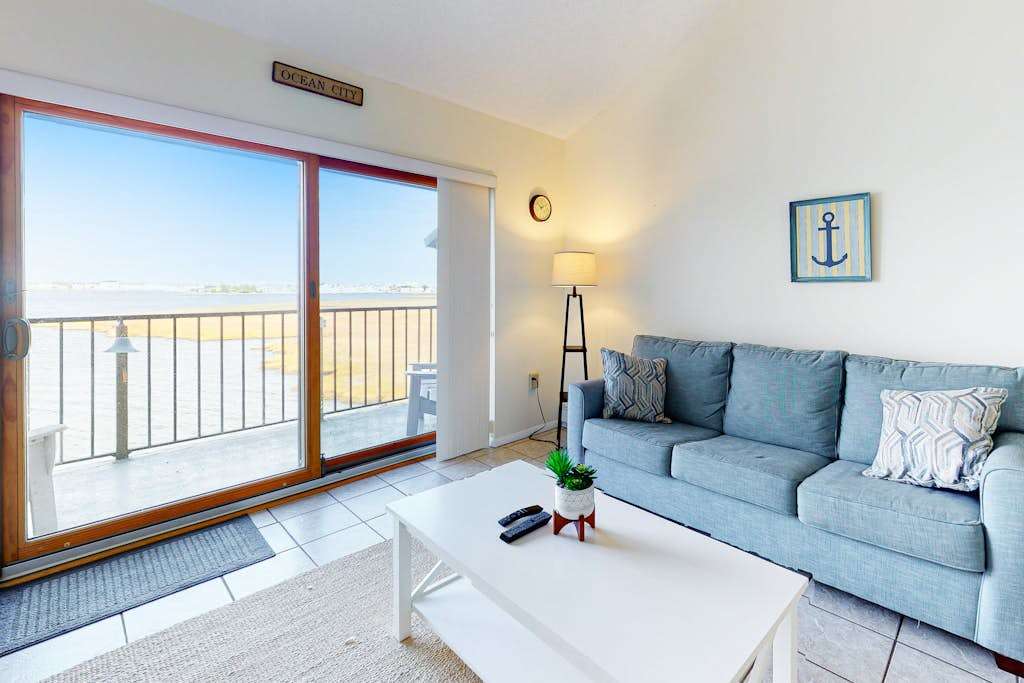 Two-Level Bayfront Condo with Amazing Sunsets, Balcony, WiFi & Shared Pool