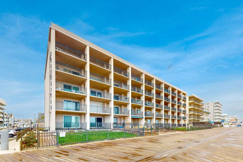 Oceanfront condo on the boardwalk with balcony, central AC, WiFi, & great view