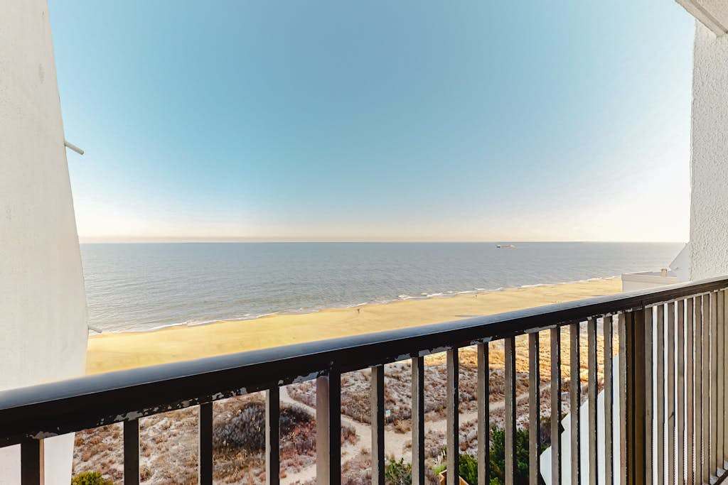 Oceanfront Condo with a Shaded Balcony, AC, WiFi & Shared Outdoor Pool