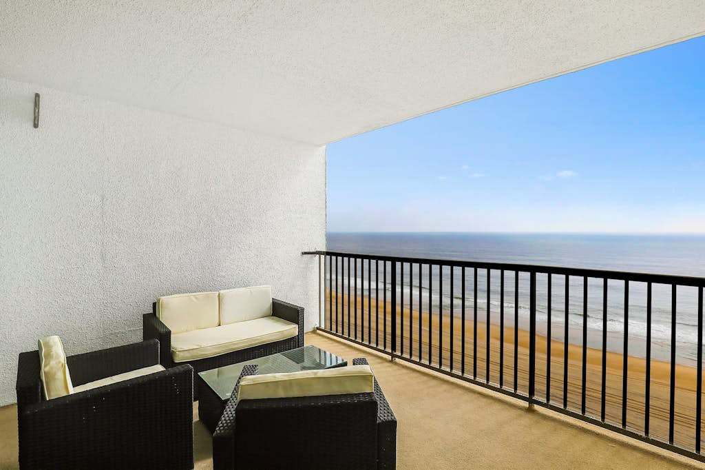 Oceanfront condo with ocean view, private washer & dryer, central AC, and pool access