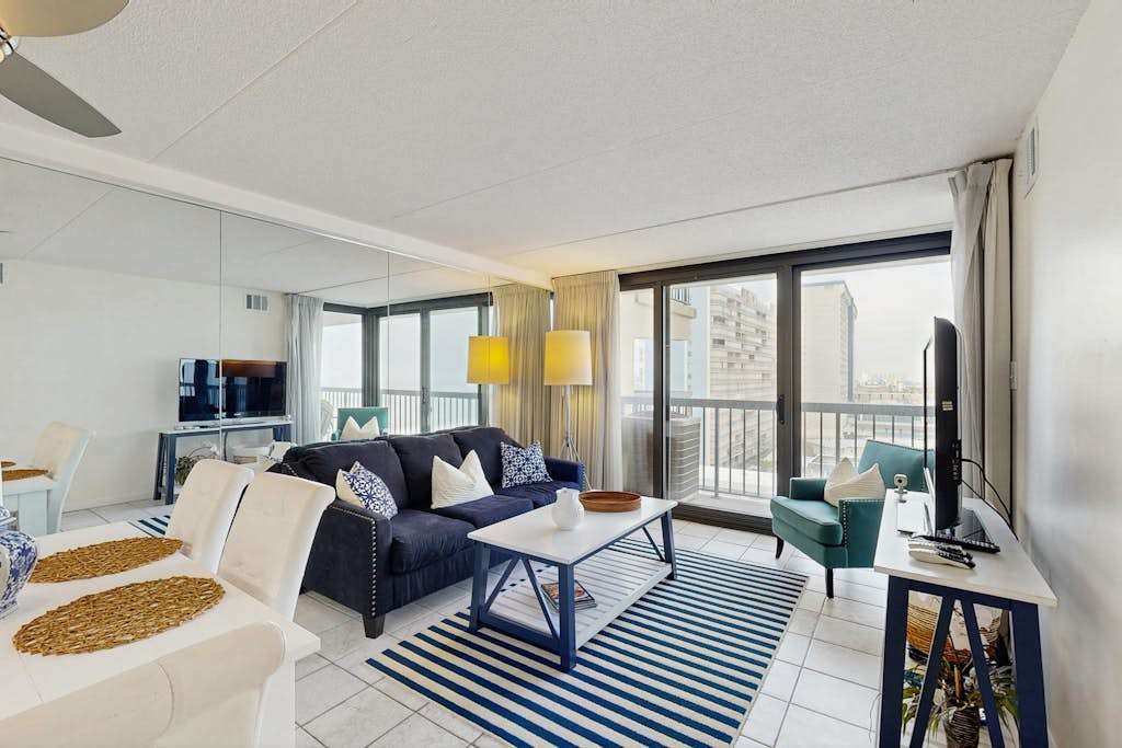 Modern, ocean-view condo with balcony, pools, saunas, tennis & gym