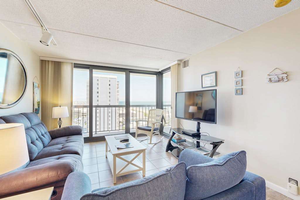 Beach condo with balcony, washer & dryer, pools, game room, tennis & gym