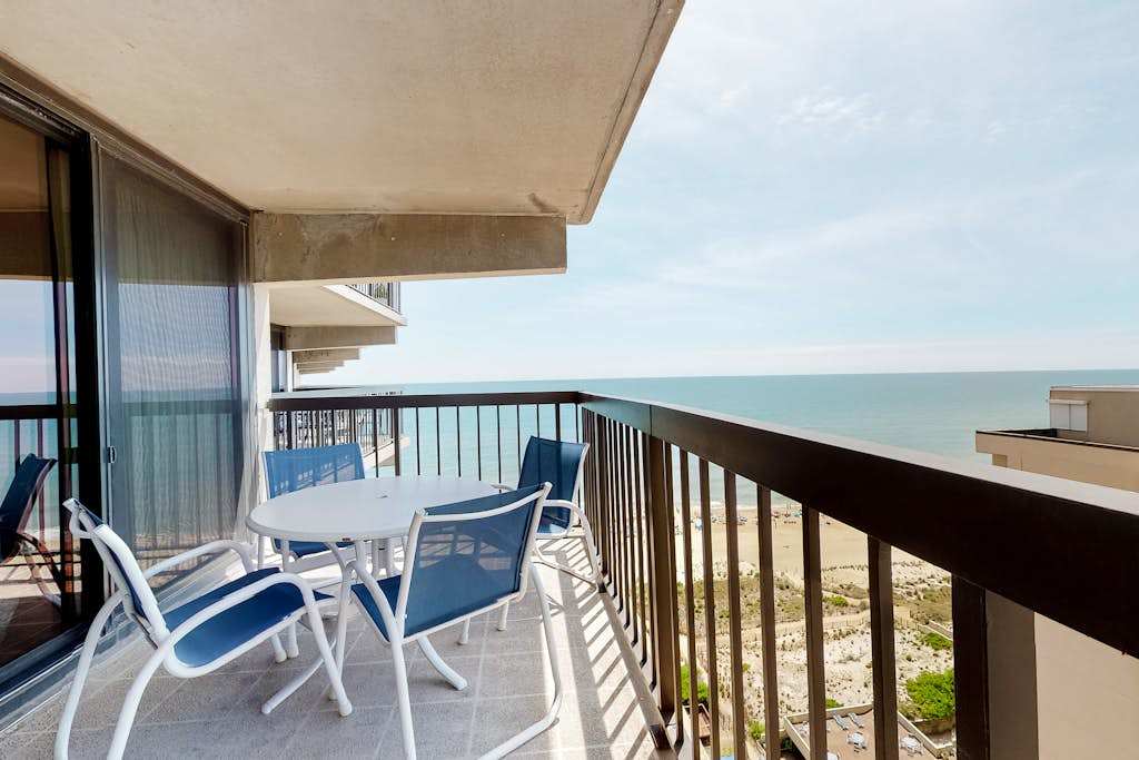 Astounding beach condo with balcony, pools, gym, game room & tennis