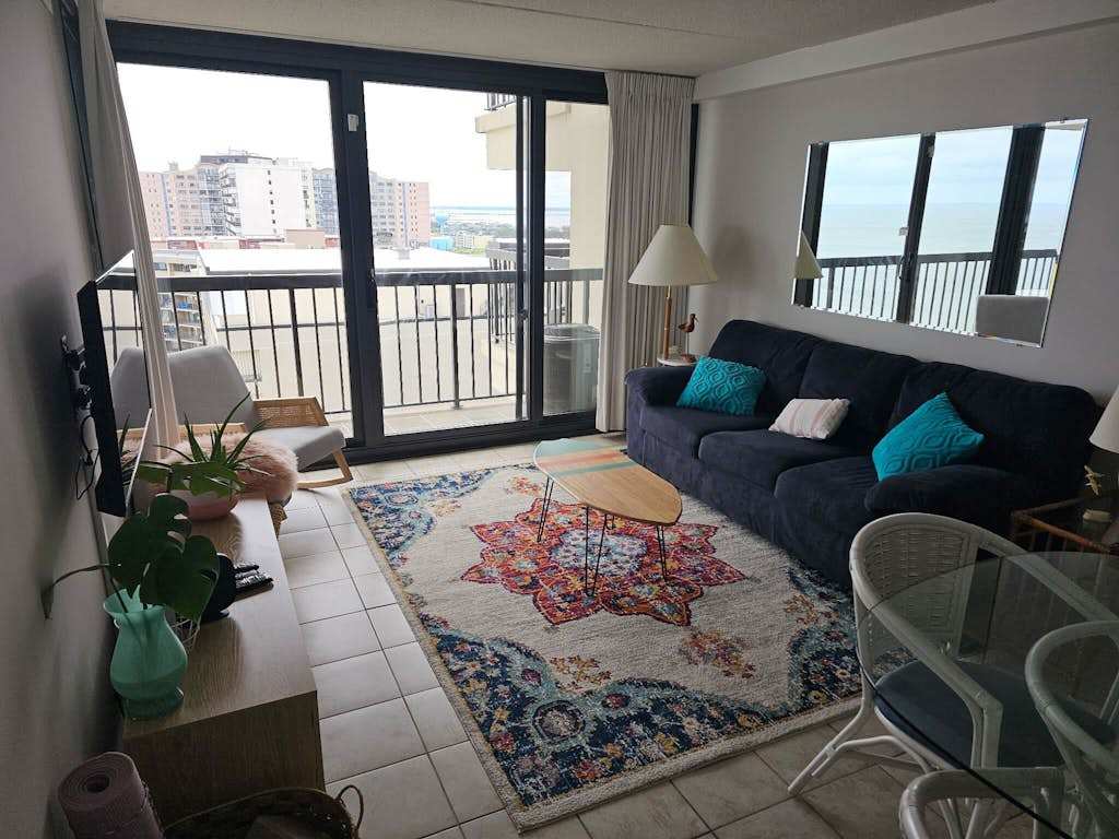 Superb beach condo with balcony, views, pools, gym, tennis, sauna & AC