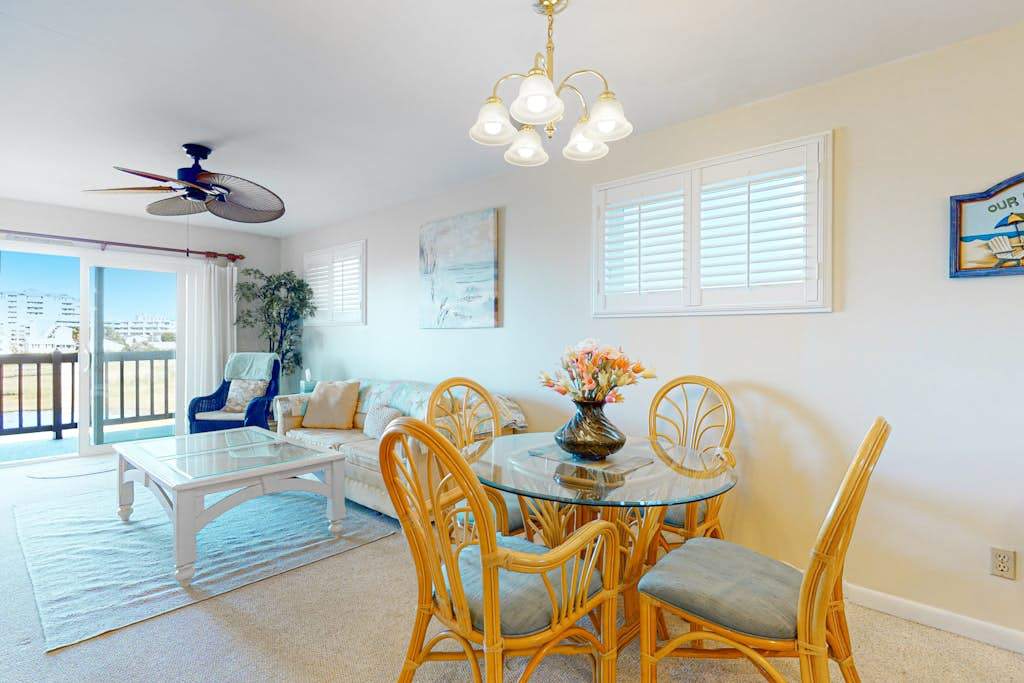 Bayfront Condo with Bay & Wetland Views, Balcony, WiFi & AC - Walk to the Beach