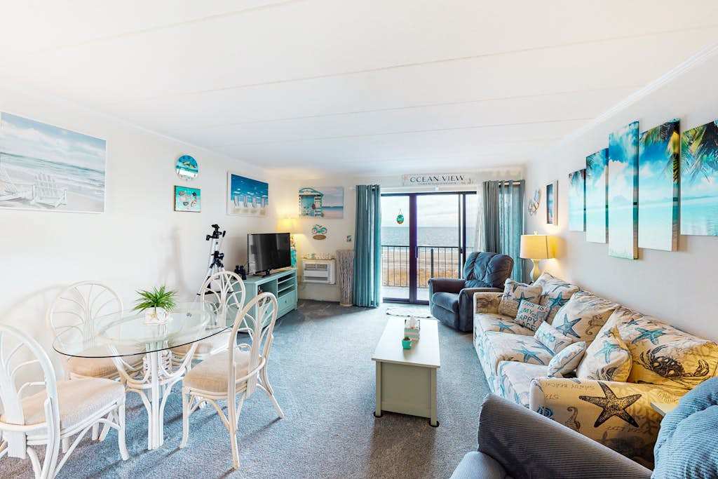 Oceanfront Condo with Direct Beach View, Balcony, AC, WiFi & Laundry