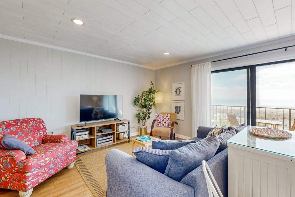 Waterfront perch with pool, private balcony, beach access, and WiFi