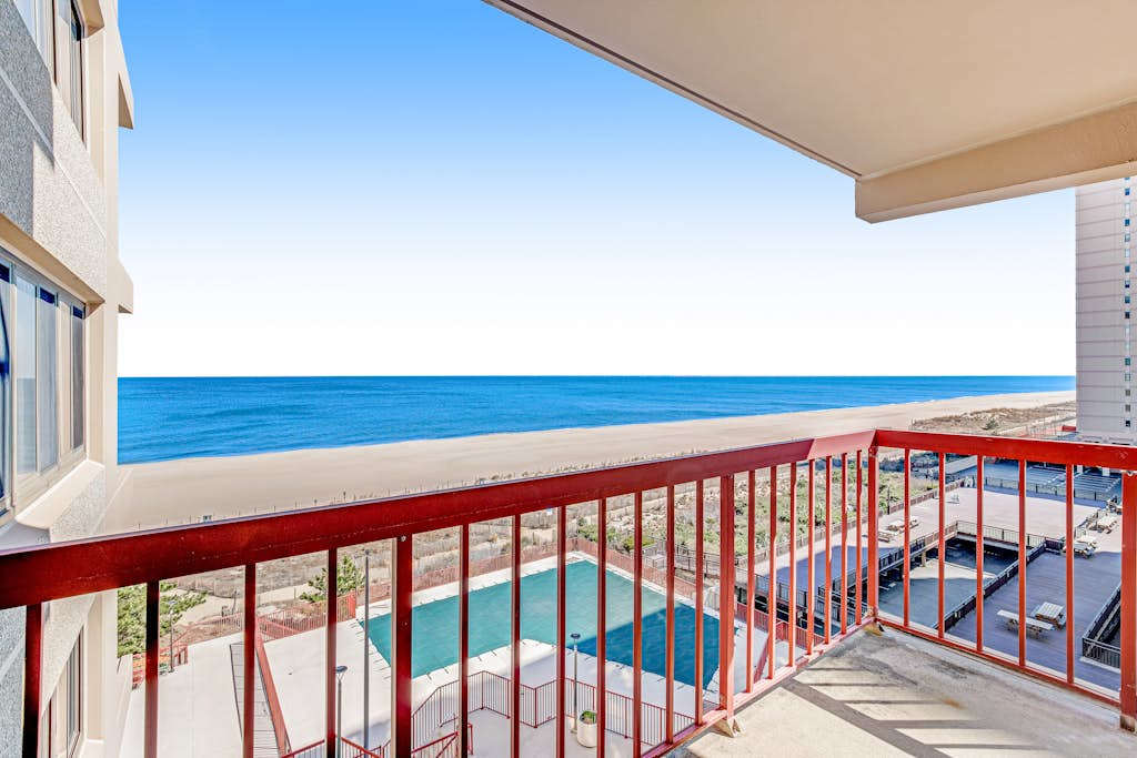 Oceanfront condo with beach access, pool, furnished balcony, & fast WiFi