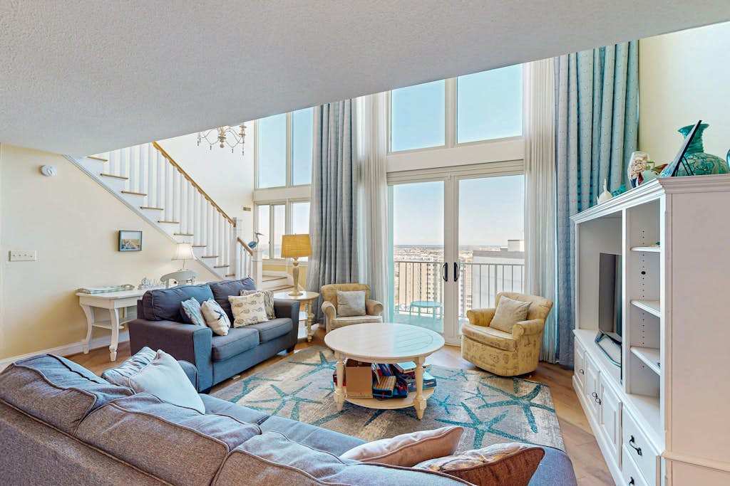 Two-story beachfront penthouse with ocean & bay views, pools & game room