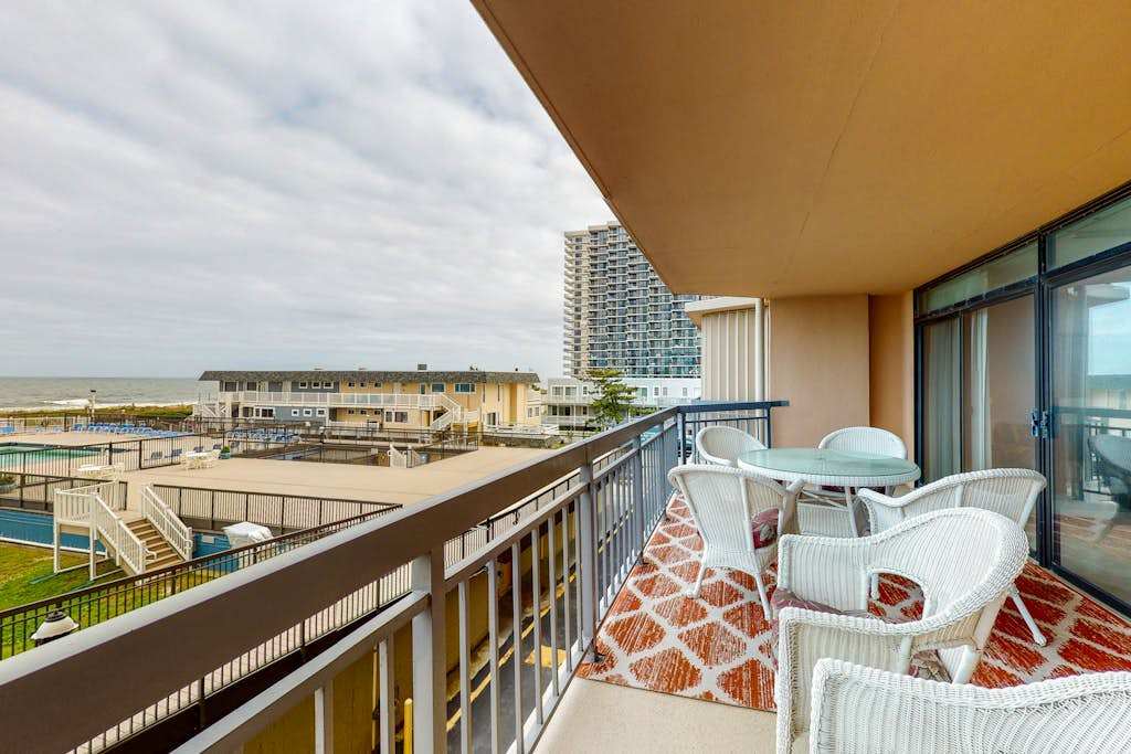 Ocean-view condo with private balcony, central AC, & shared pool & tennis court