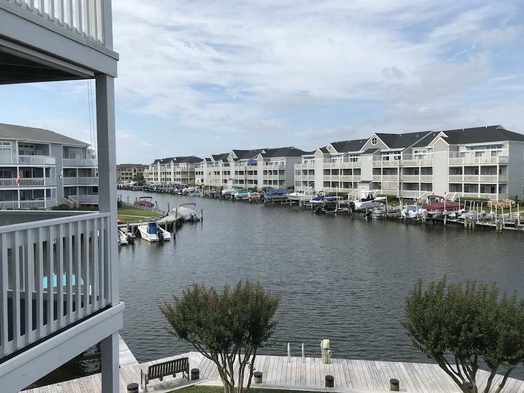 Waterfront escape with two pools, outdoor shower, balcony, WiFi & central AC