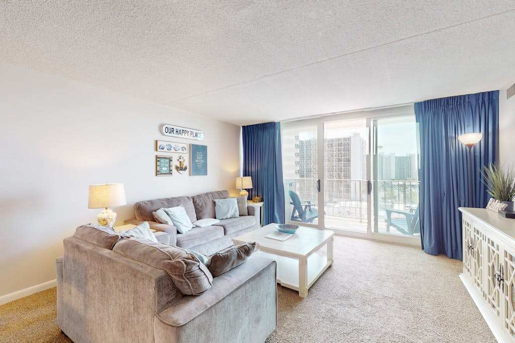Beachfront condo with ocean and bay views, fast WiFi, pools, & game room