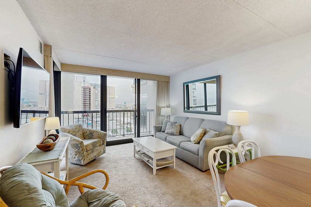 Oceanfront condo with balcony overlooking the beach, pools, tennis & gym
