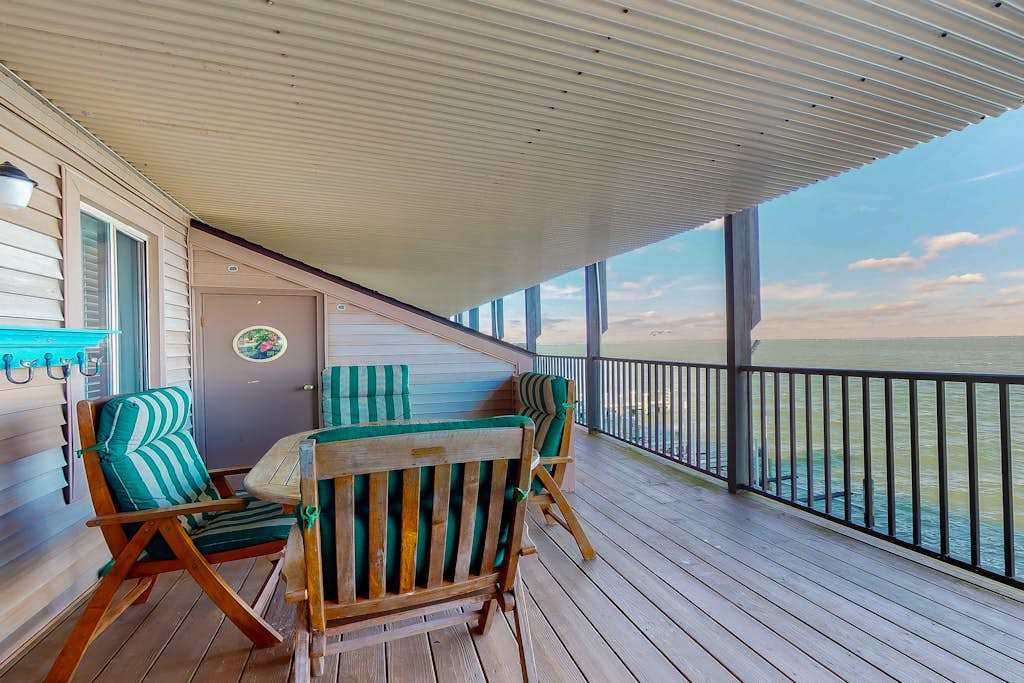 Bay-view condo with pool, covered deck, & fishing & crabbing dock - walk to beach