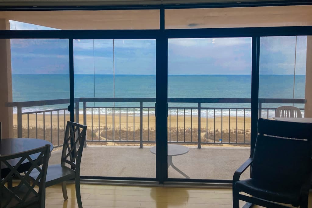 Beachfront condo with bay & ocean views, outdoor pool, & tennis courts