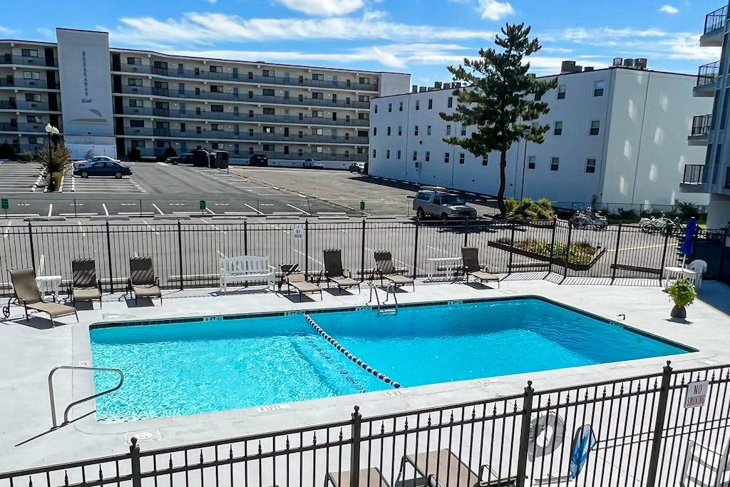 Recently updated condo with pool, private balcony, & washer & dryer