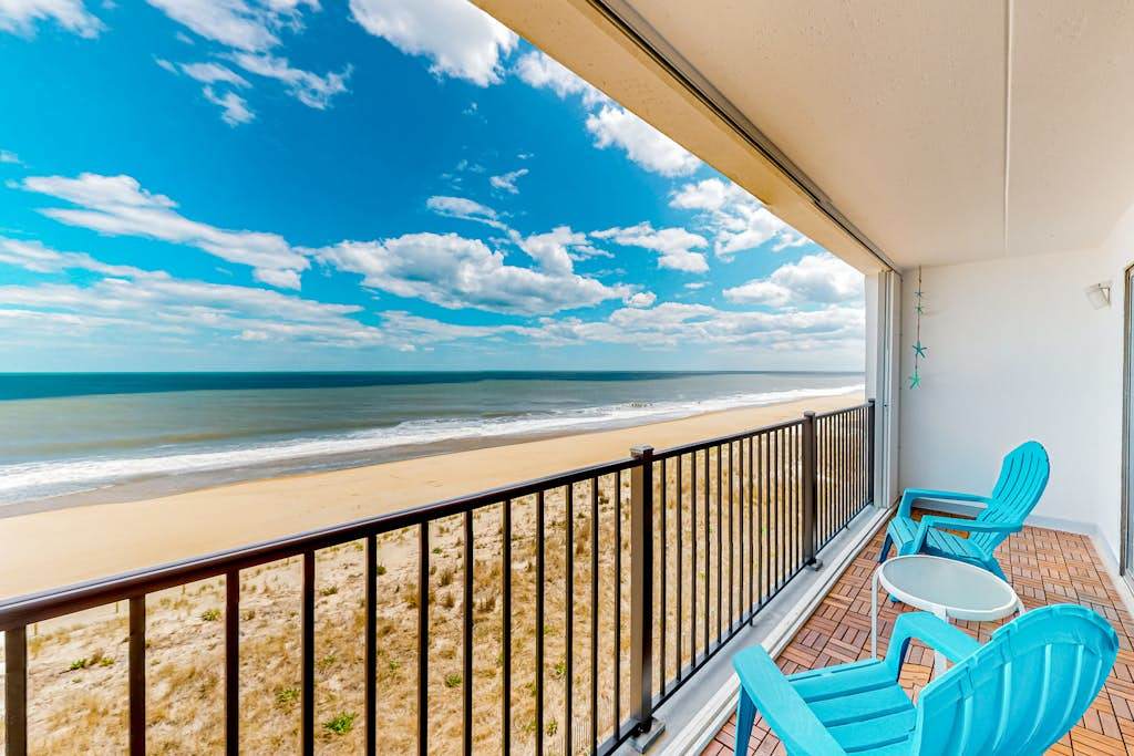 Beachfront condo with ocean views, private balcony, central AC, & washer & dryer