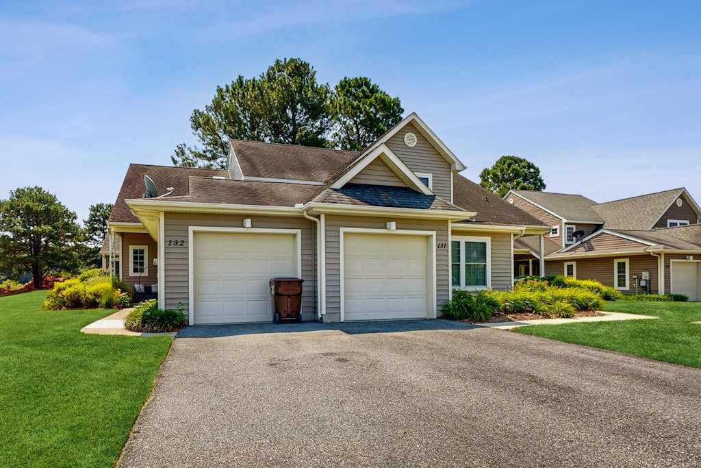 Coastal resort with pool, golf, fireplace, washer & dryer, & sunroom 