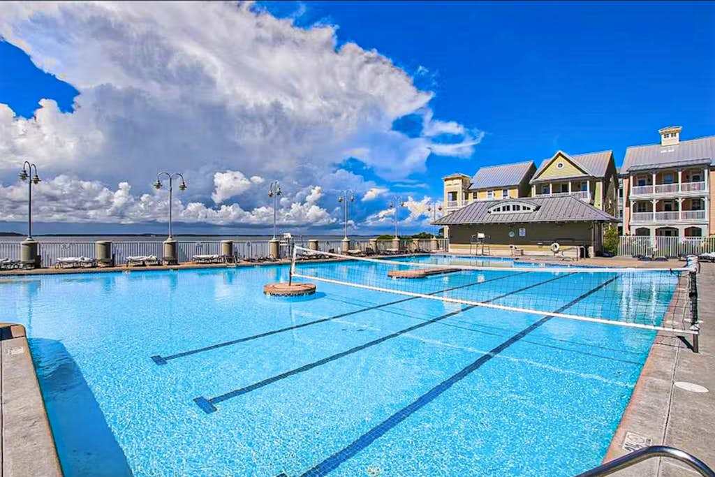 Coastal retreat with beach and shared pool - balconies, AC, & washer & dryer