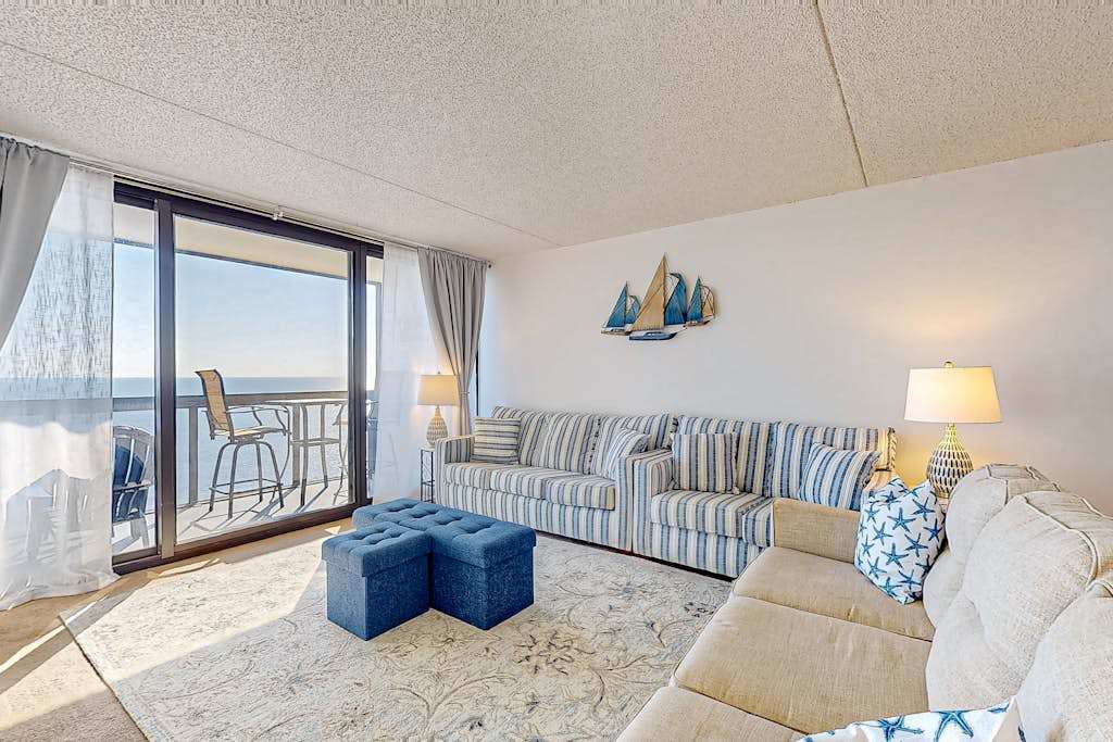 Beachfront condo with beach access, pools, sauna, game room, tennis, gym, washer & dryer
